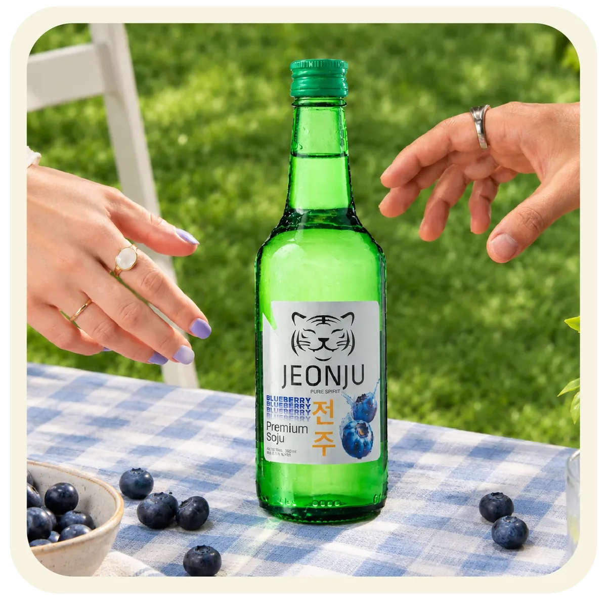 Jeonju Blueberry Soju bottle with blueberries