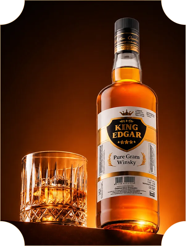 King Edgar whisky bottle beside a glass